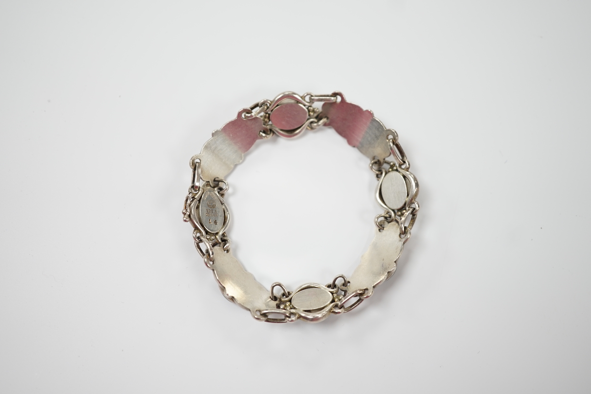 A 1970's Georg Jensen silver and cabochon nephrite set bracelet, design no.16, 18cm.